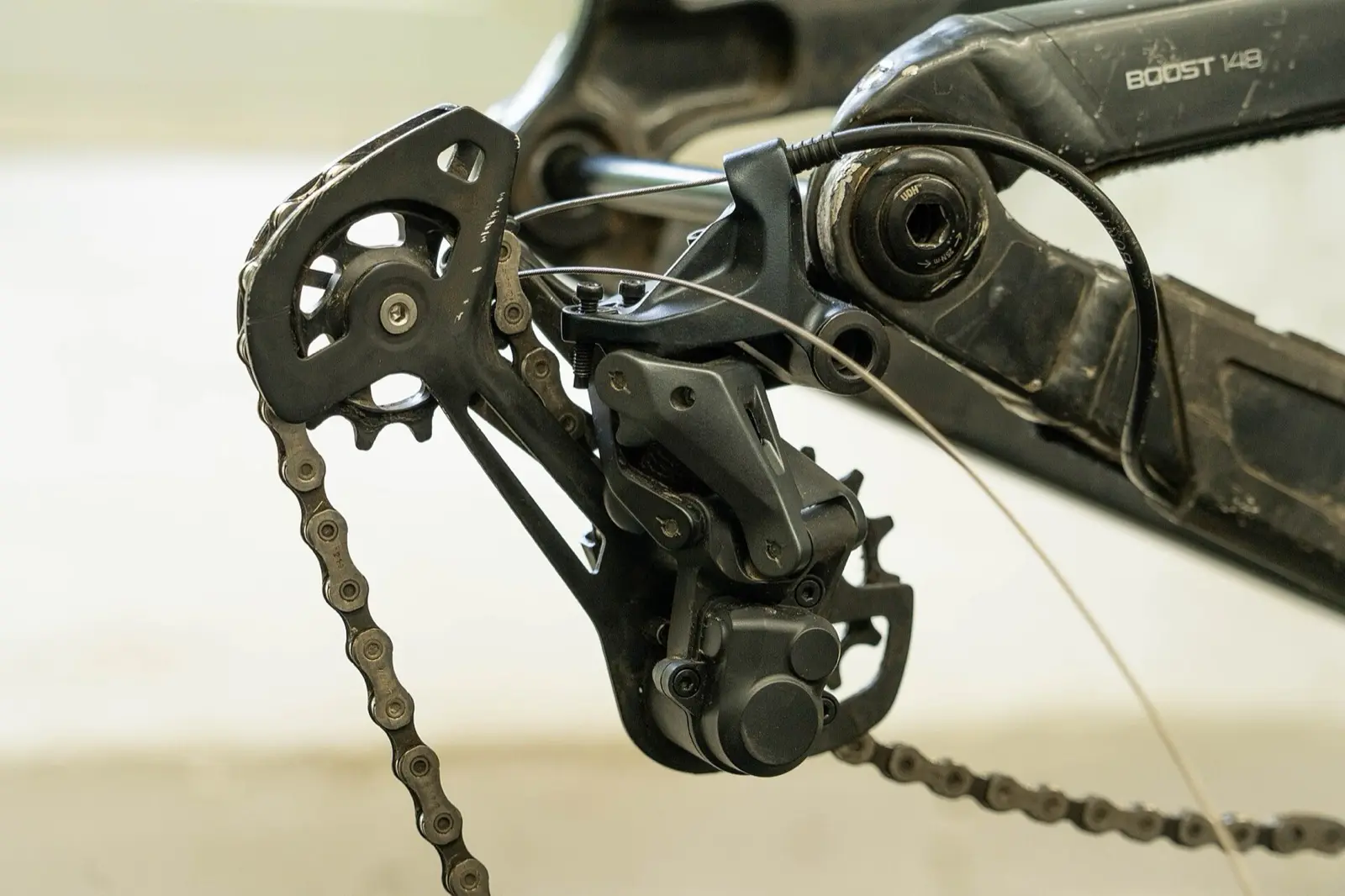 Close view of a rear derailleur and chain
